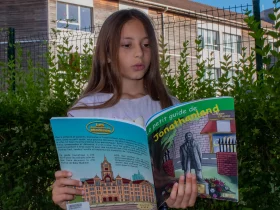 Isma is reading The Little Jonathanland Guidebook